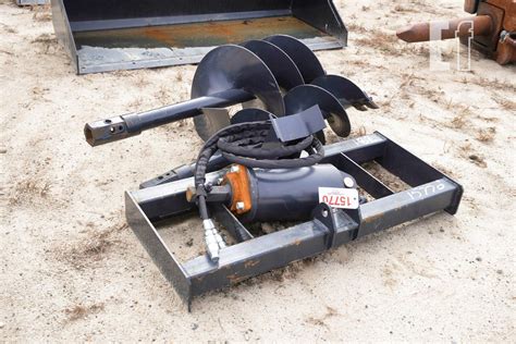 wolverine skid steer auger specs|skid steer tiller wolverine attachment.